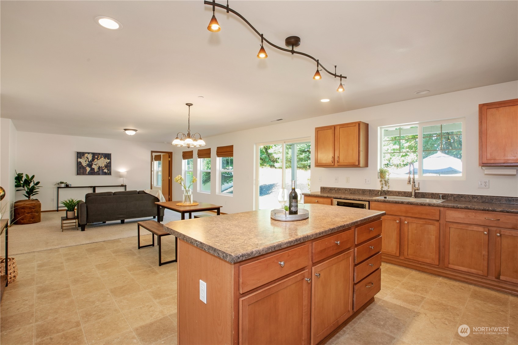 3139 Walker Road DuPont, WA 98327 - Photo 13 of 40 a kitchen with sink refrigerator and large window