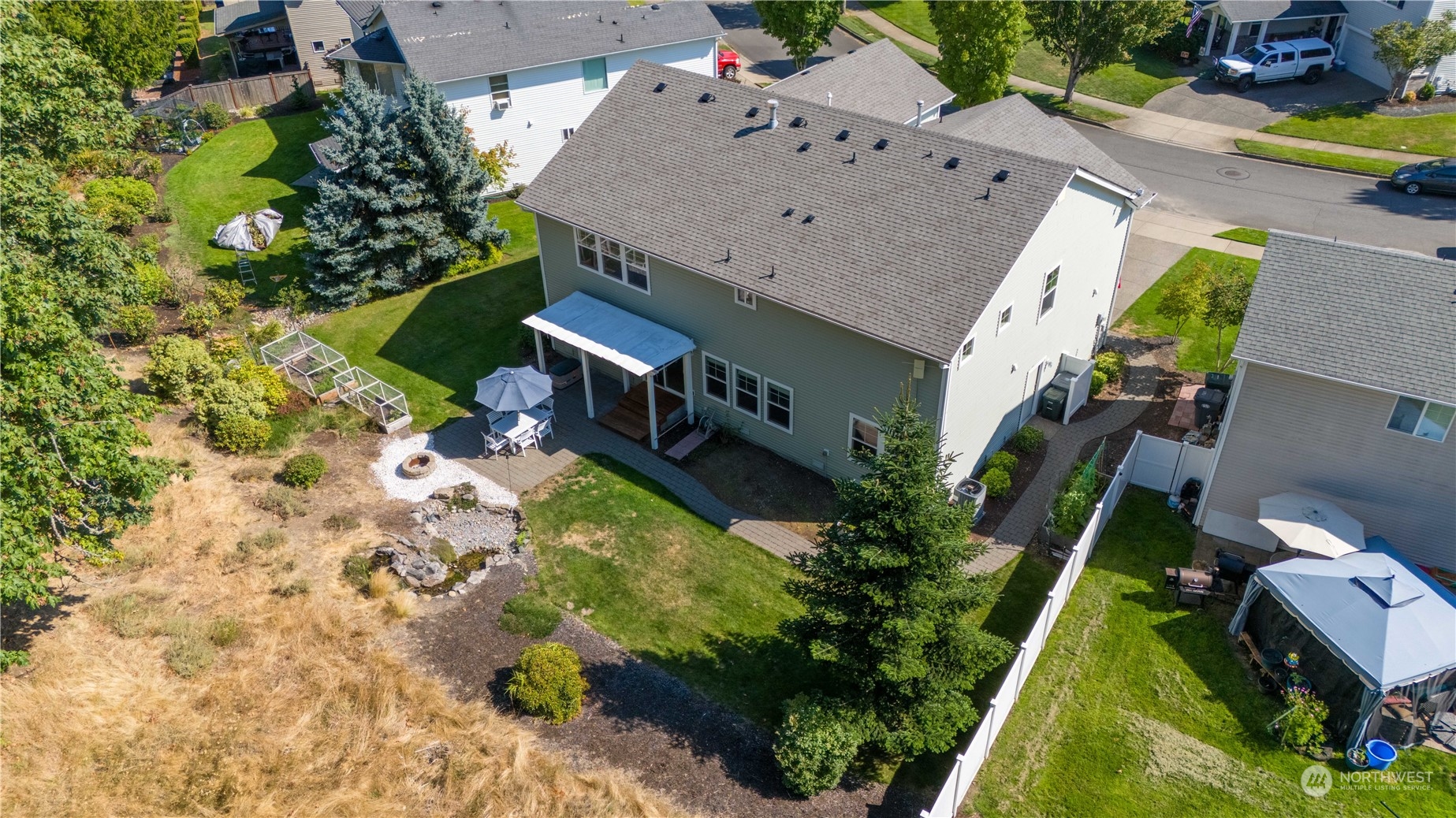 3139 Walker Road DuPont, WA 98327 - Photo 36 of 40 an aerial view of a house with a yard basket ball court and outdoor seating