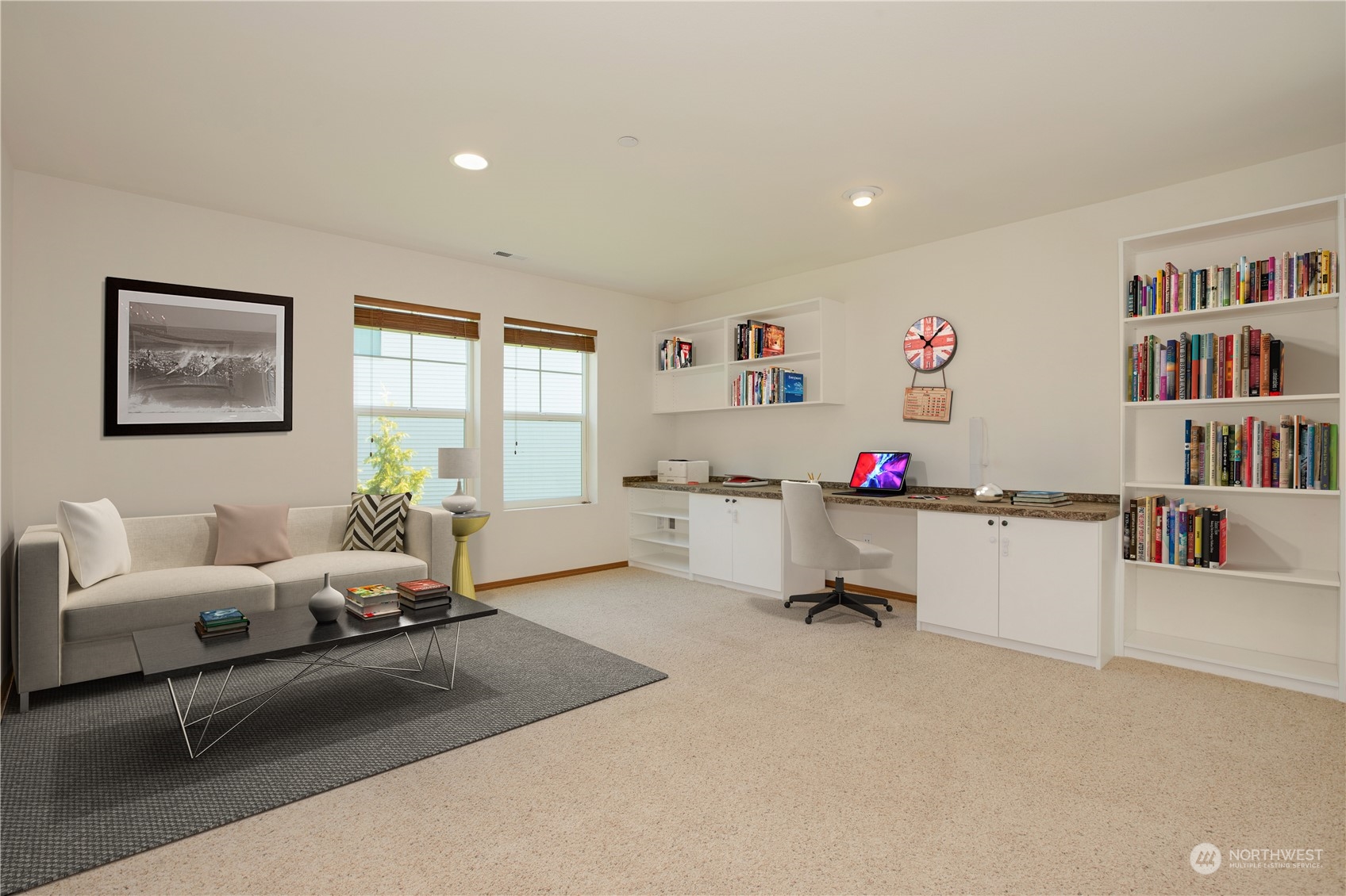 3139 Walker Road DuPont, WA 98327 - Photo 5 of 40 a room with furniture and a book shelf
