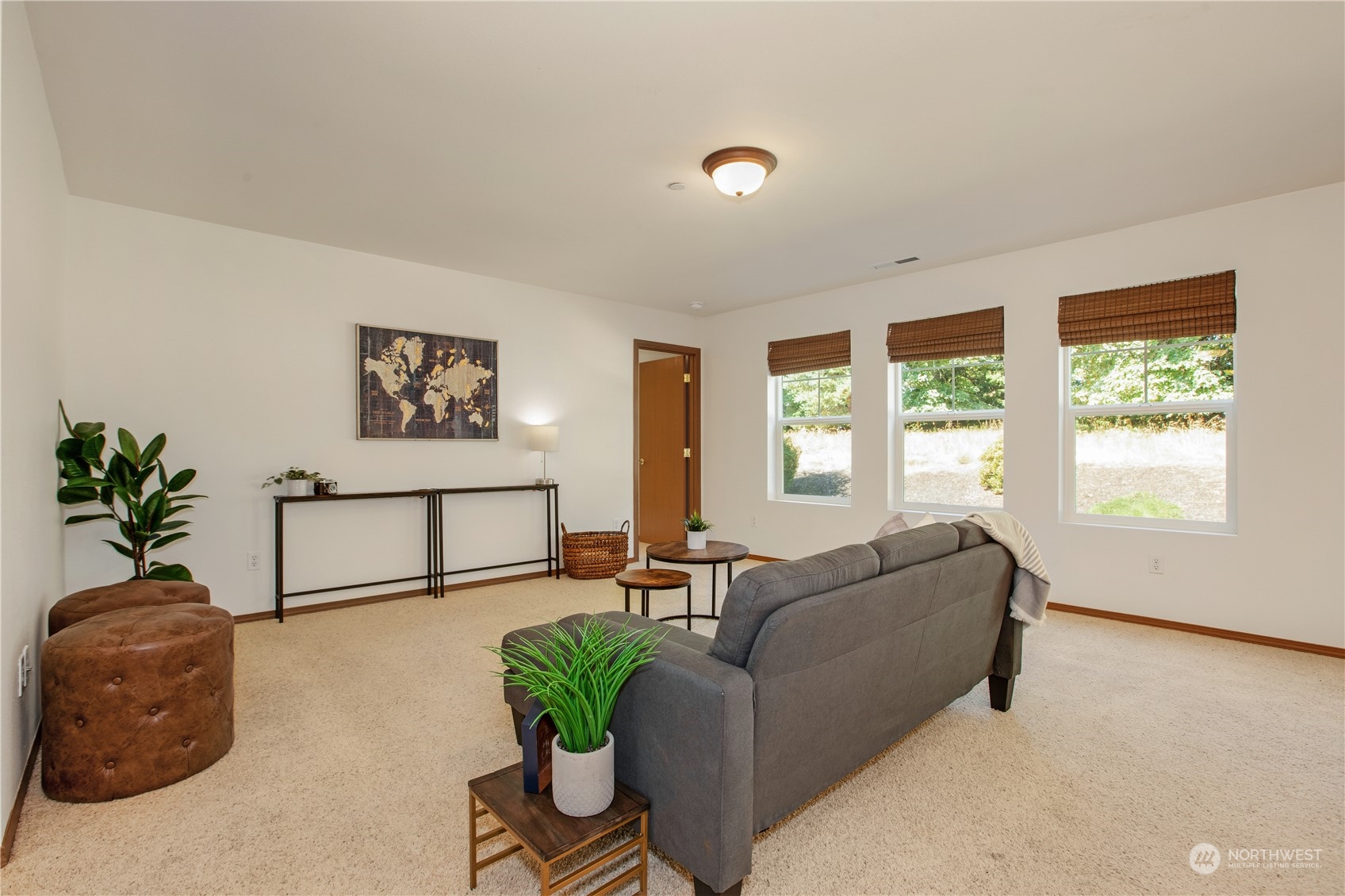 3139 Walker Road DuPont, WA 98327 - Photo 7 of 40 a living room with furniture and a potted plant