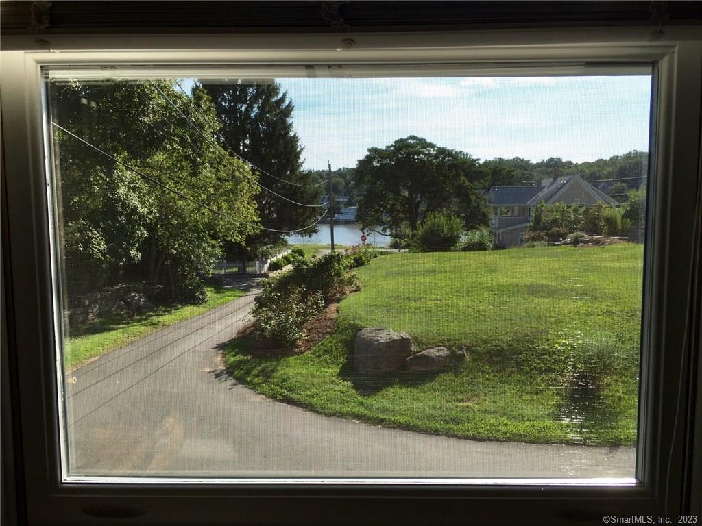 87 Decatur Avenue Guilford, CT 06437 - Photo 13 of 29 a view of a back yard from a window