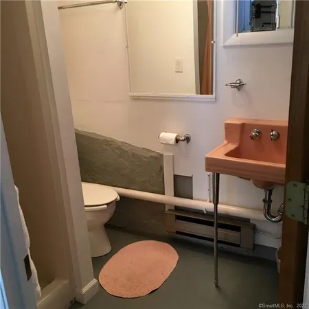 a bathroom with a toilet