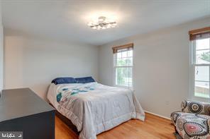 17 Devon Court Sterling, VA 20165 - Photo 15 of 30 a bedroom with a bed and a window
