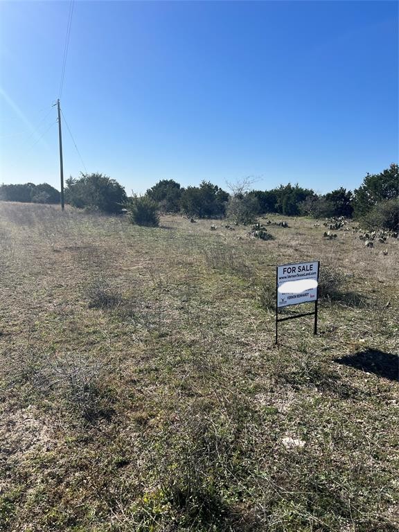 Lot 138 High Point Drive Kempner, TX 76539 - Photo 6 of 17 a wooden bench sitting in a backyard