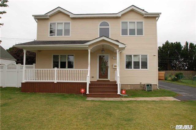 3596 Condor Road Levittown, NY 11756 - Photo 1 of 1 a view of a house with a yard