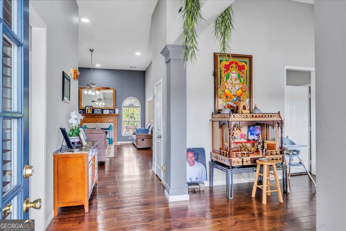 605 Dodds Walk Macon, GA 31220 - Photo 2 of 68 a living room with furniture and a wooden floor