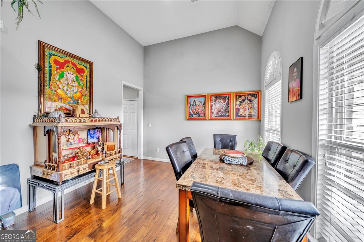 605 Dodds Walk Macon, GA 31220 - Photo 3 of 68 a living room with furniture and a flat screen tv
