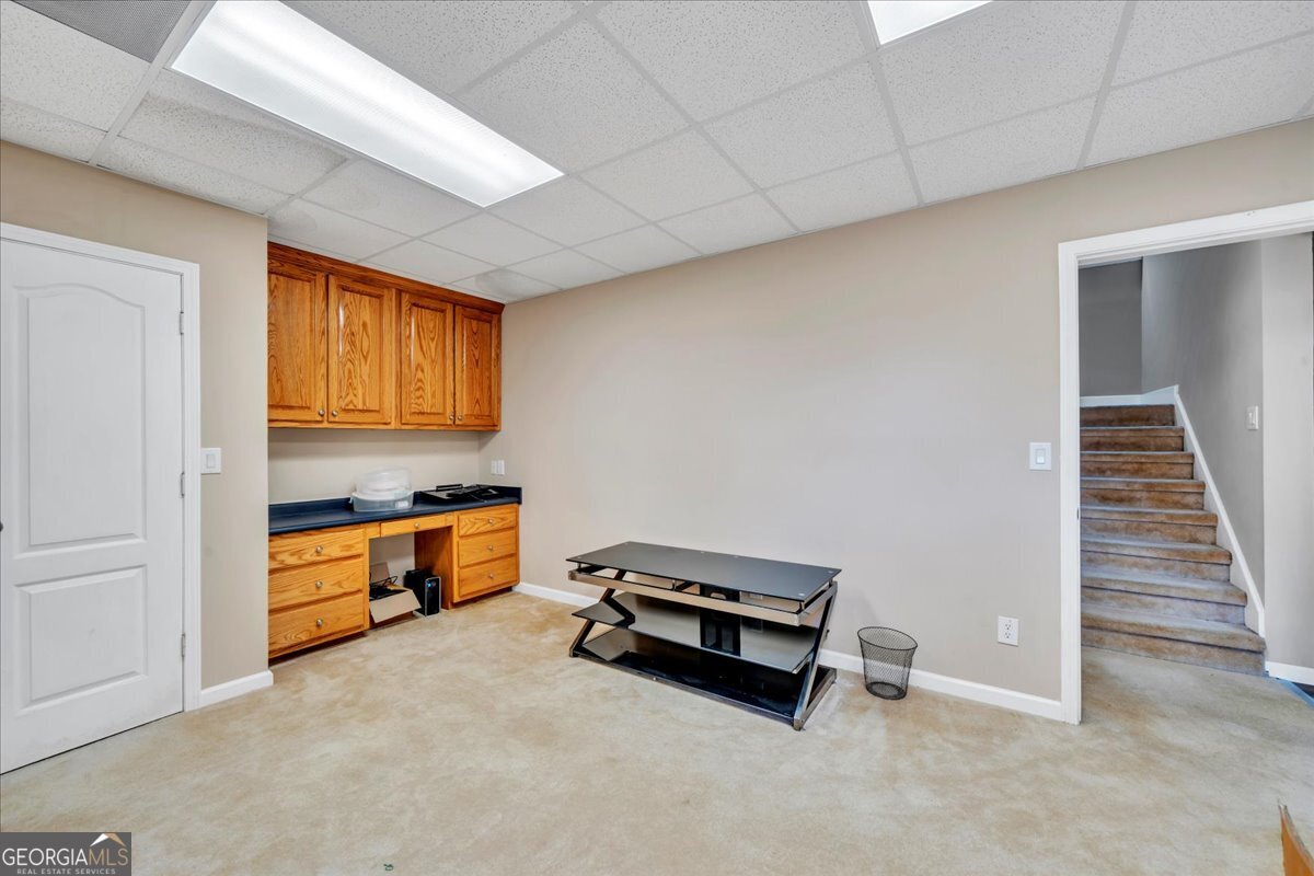 605 Dodds Walk Macon, GA 31220 - Photo 33 of 68 a room with furniture and a window