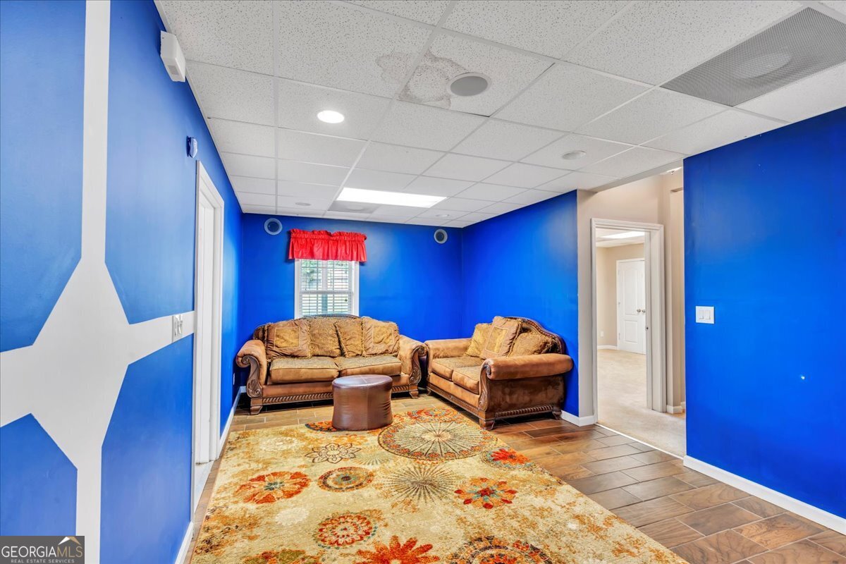 605 Dodds Walk Macon, GA 31220 - Photo 39 of 68 a bedroom with furniture and wooden floor