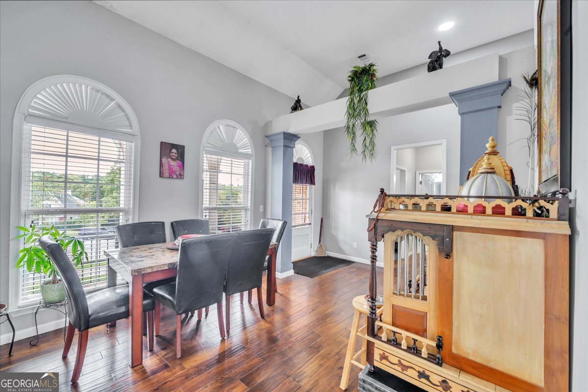 605 Dodds Walk Macon, GA 31220 - Photo 4 of 68 a view of a dining room with furniture window and wooden floor