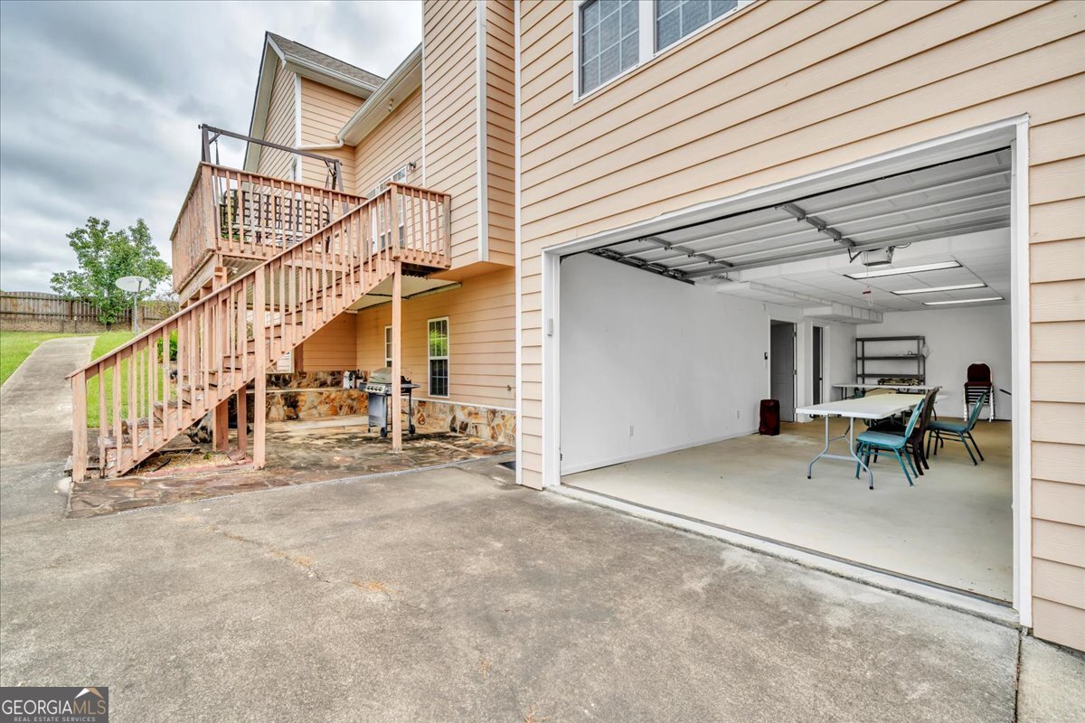 605 Dodds Walk Macon, GA 31220 - Photo 44 of 68 a view of a house with table and chairs