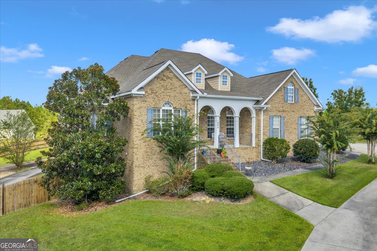 605 Dodds Walk Macon, GA 31220 - Photo 54 of 68 a front view of a house with a yard