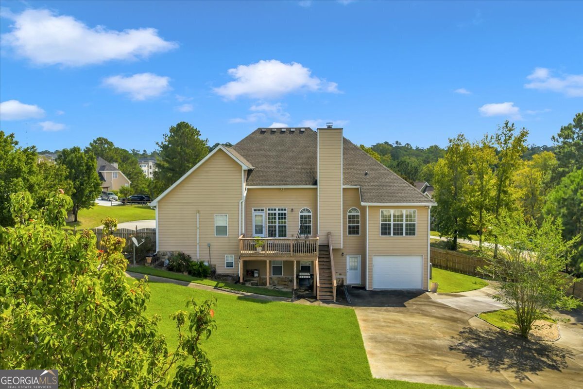 605 Dodds Walk Macon, GA 31220 - Photo 57 of 68 a view of a house with a big yard plants and large trees
