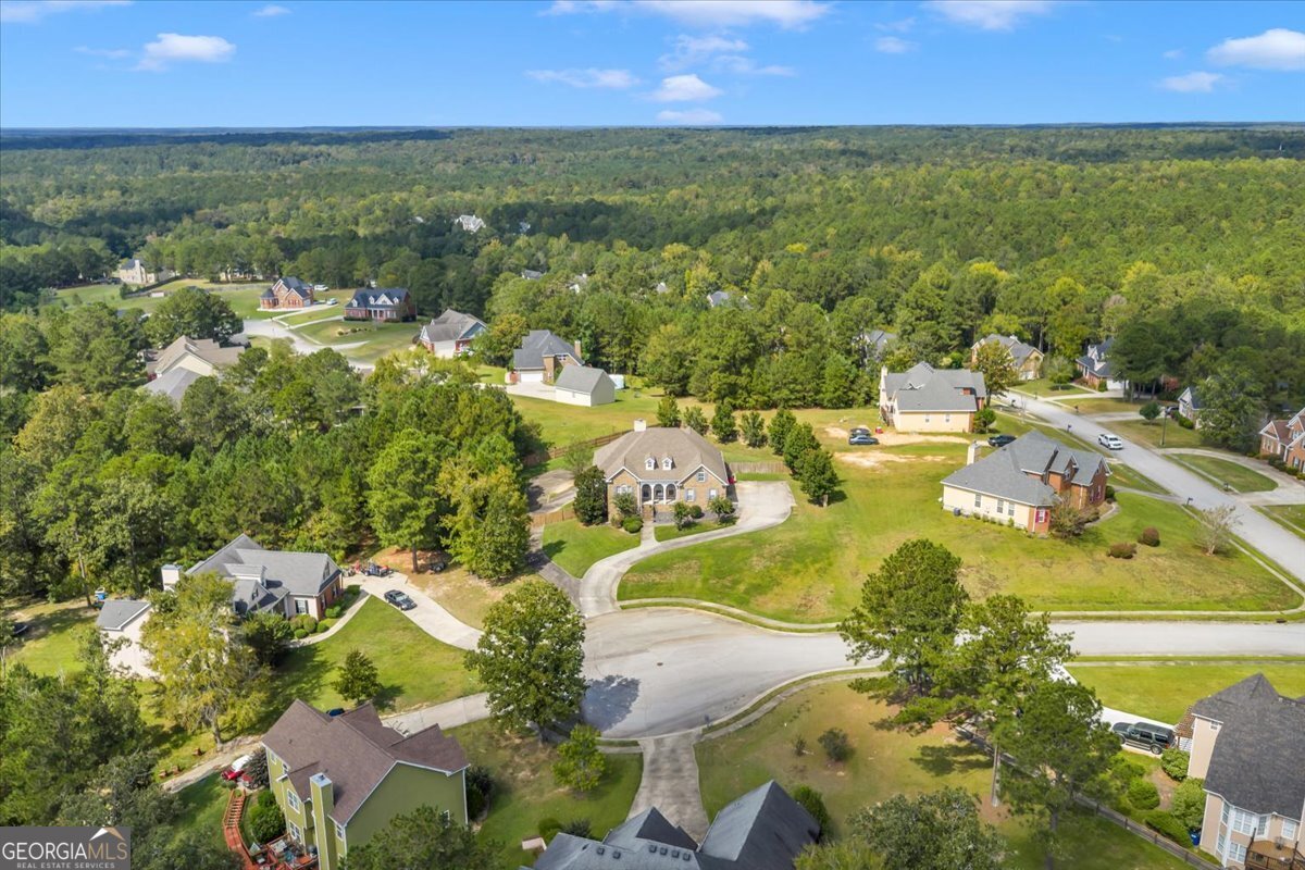 605 Dodds Walk Macon, GA 31220 - Photo 66 of 68 an aerial view of residential houses with outdoor space and swimming pool