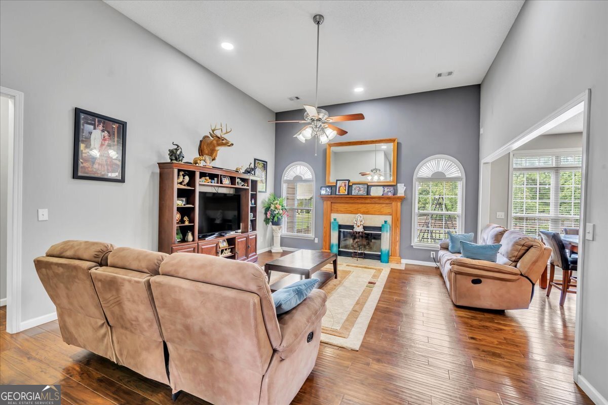 605 Dodds Walk Macon, GA 31220 - Photo 7 of 68 a living room with fireplace furniture and a large window