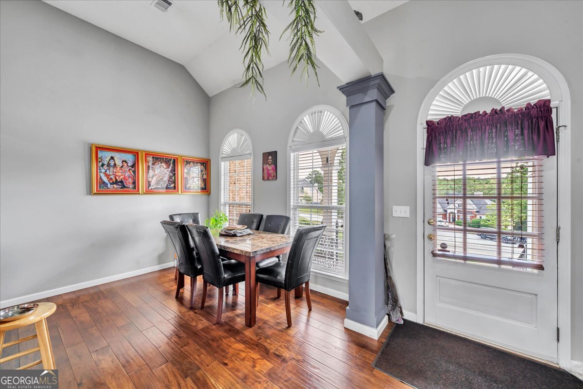 605 Dodds Walk Macon, GA 31220 - Photo 8 of 68 a view of a dining room with furniture window and wooden floor