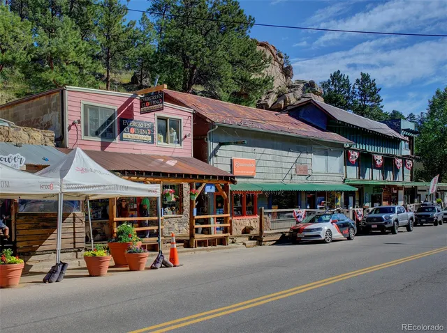 a view of a street with cars