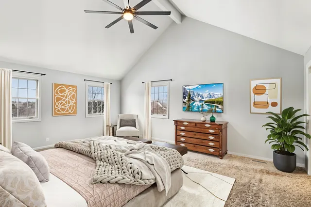 a bedroom with a bed and furniture