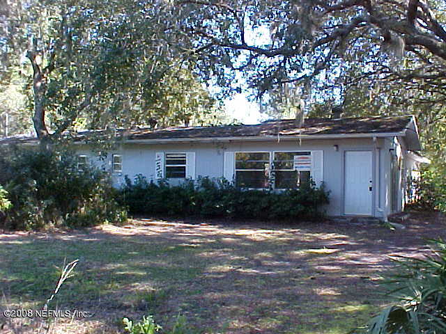 396 Beecher Springs Road Crescent City, FL 32112 - Photo 1 of 17 a front view of a house with a yard