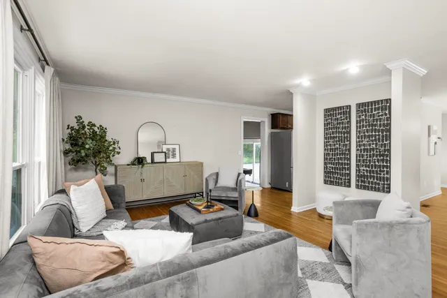 a living room with furniture and window