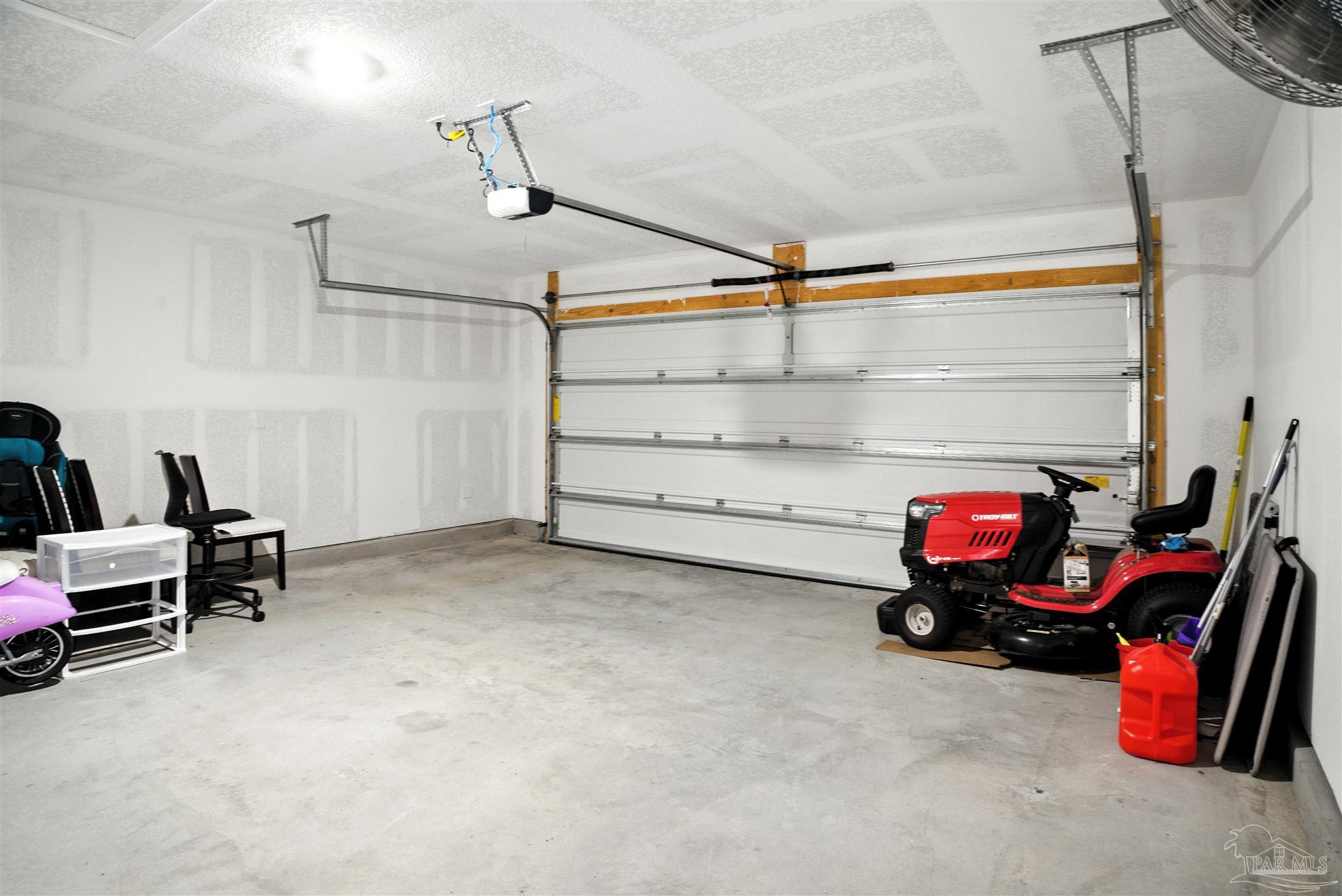 4710 Carl Booker Road Milton, FL 32583 - Photo 44 of 54 a view of a storage area with shoes and chairs