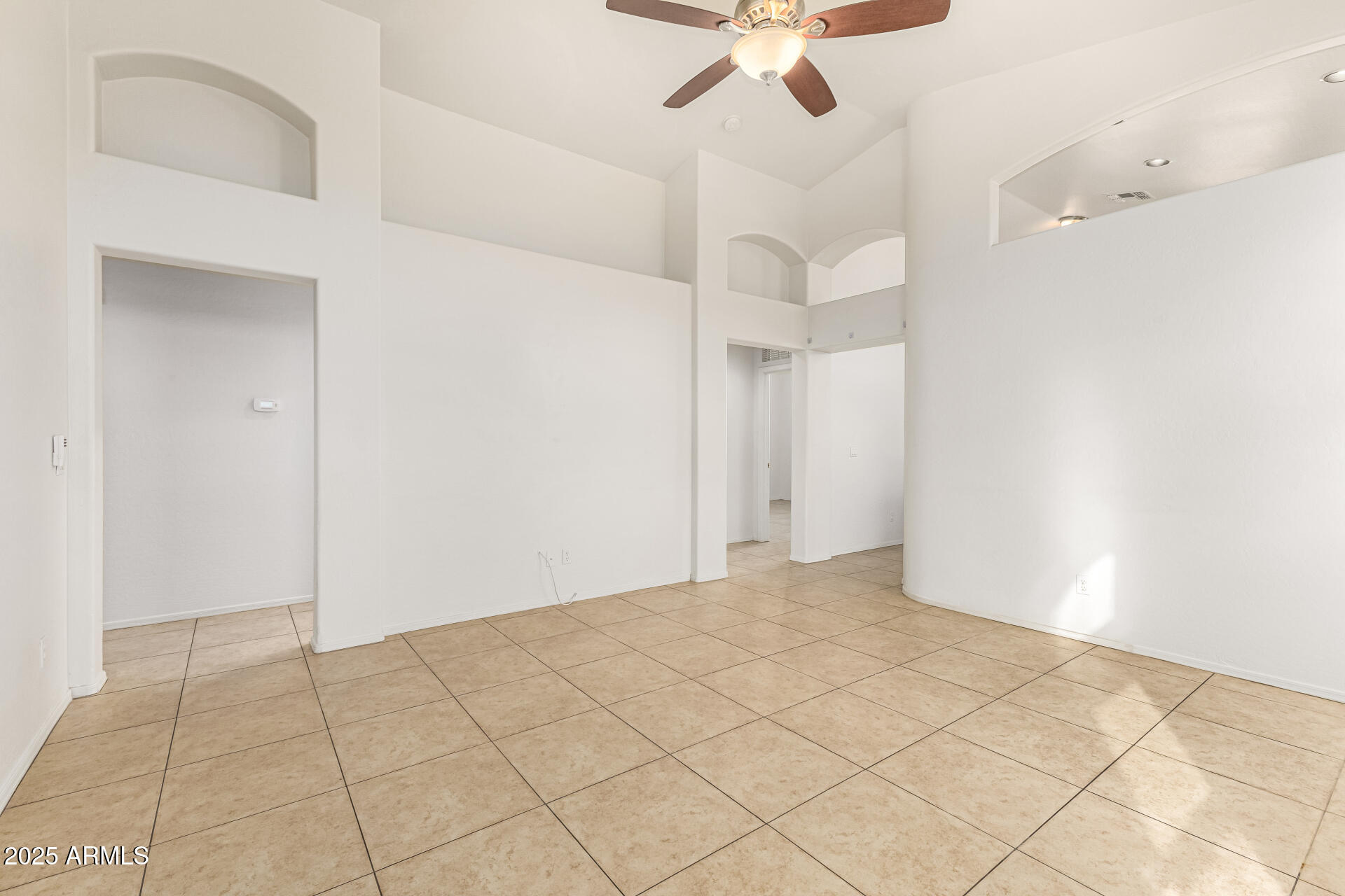 10628 West Coronado Road Avondale, AZ 85392 - Photo 6 of 29 a view of an empty room