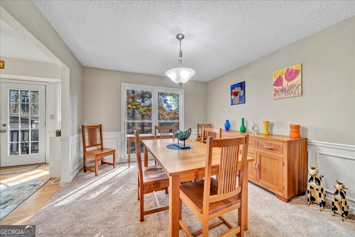 637 Will Scarlet Way Macon, GA 31220 - Photo 11 of 38 a view of a dining room with furniture window and outside view