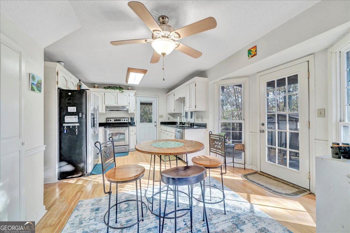 637 Will Scarlet Way Macon, GA 31220 - Photo 12 of 38 a view of a dining room with furniture