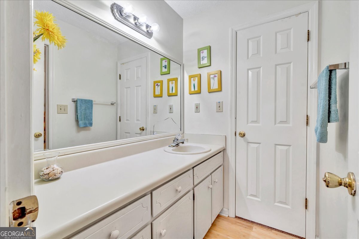 637 Will Scarlet Way Macon, GA 31220 - Photo 20 of 38 a bathroom with a sink and a mirror