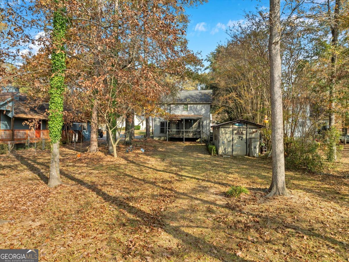 637 Will Scarlet Way Macon, GA 31220 - Photo 31 of 38 a view of a house with a yard