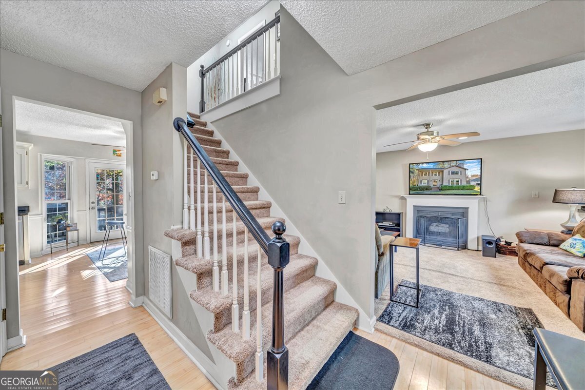 637 Will Scarlet Way Macon, GA 31220 - Photo 7 of 38 a living room with furniture and wooden floor
