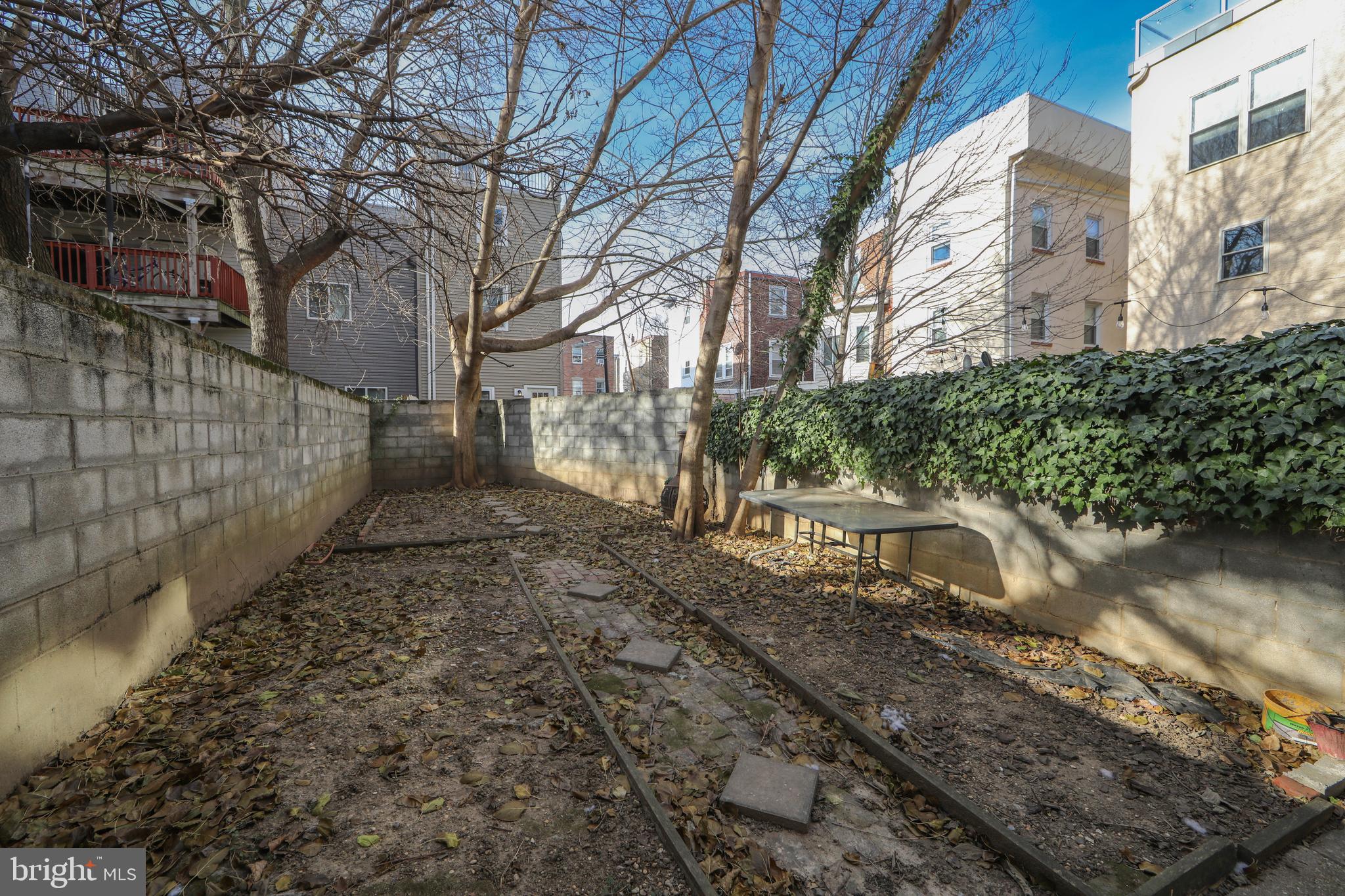 876 North 19th Street Philadelphia, PA 19130 - Photo 17 of 49 a view of a yard with plants and trees