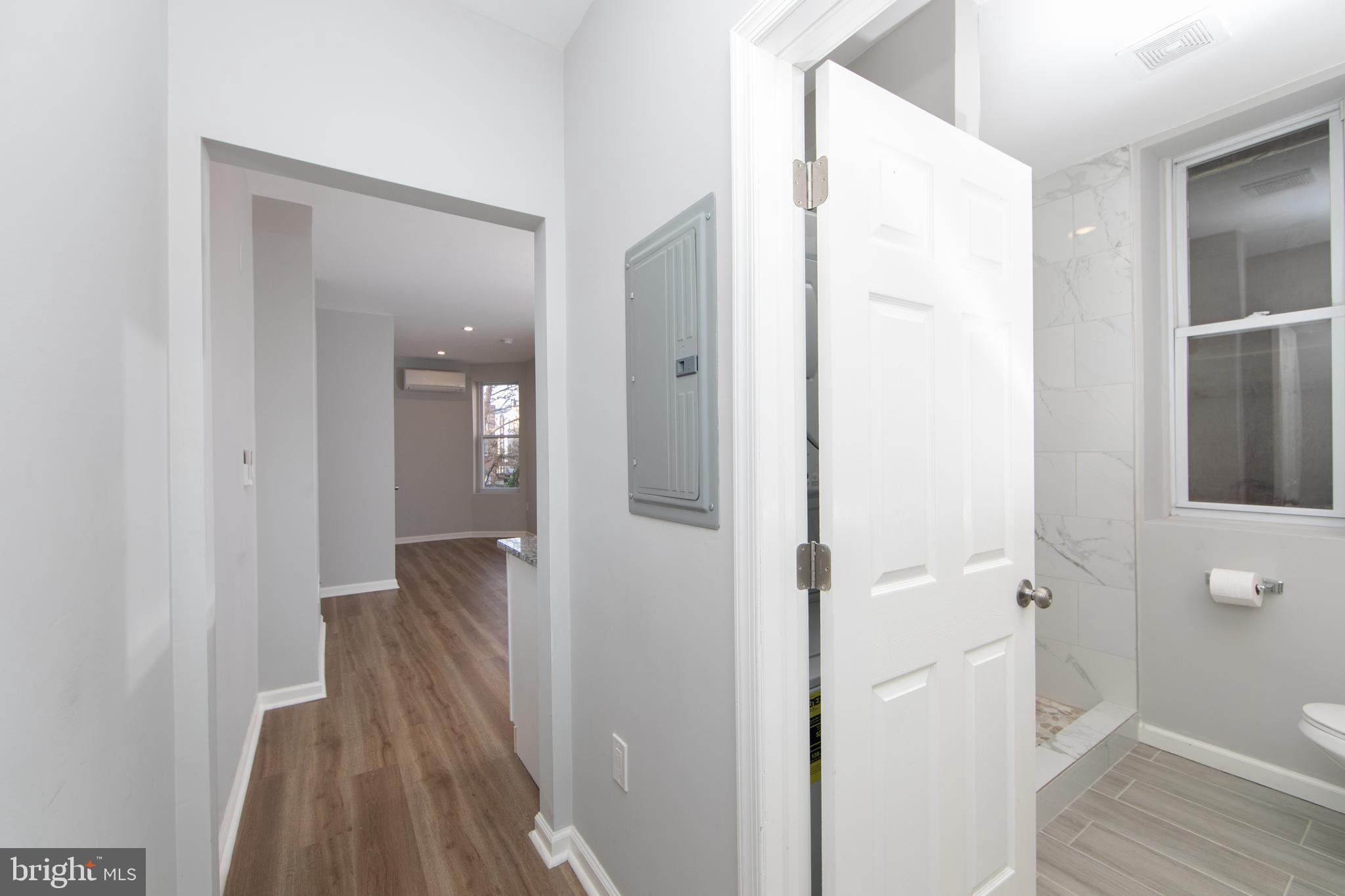 876 North 19th Street Philadelphia, PA 19130 - Photo 21 of 49 a view of a bathroom from a hallway