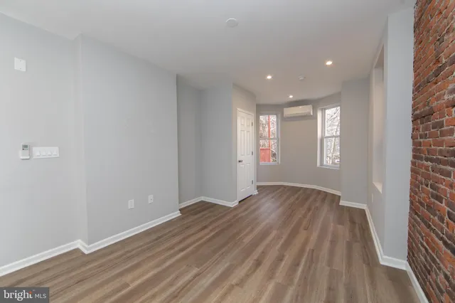 a view of entryway with wooden floor