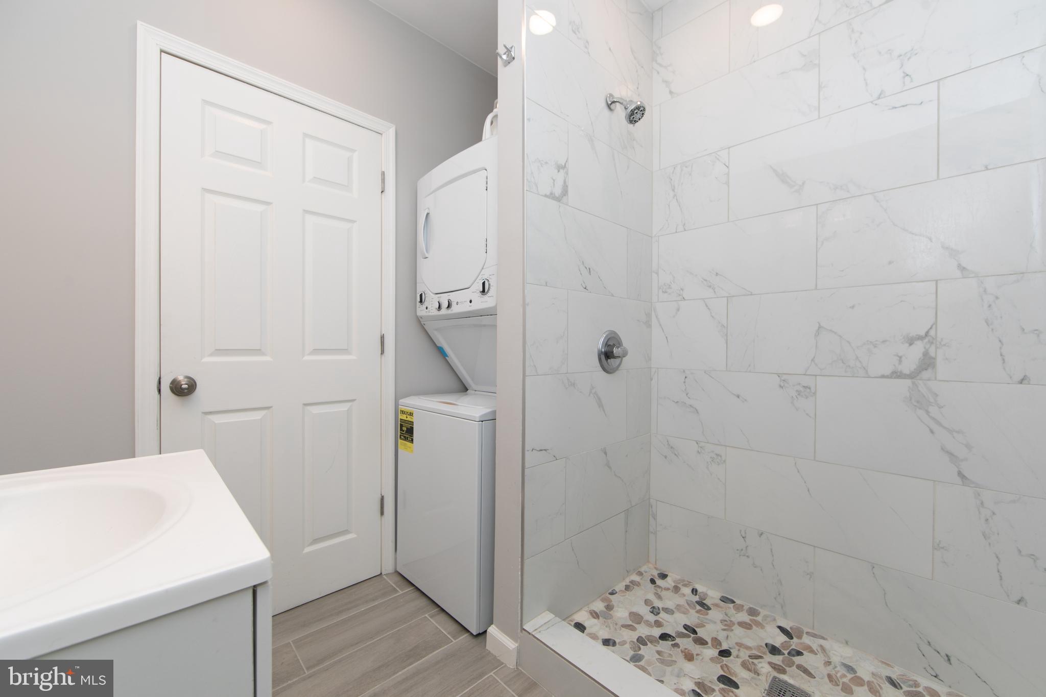 876 North 19th Street Philadelphia, PA 19130 - Photo 27 of 49 a bathroom with a shower