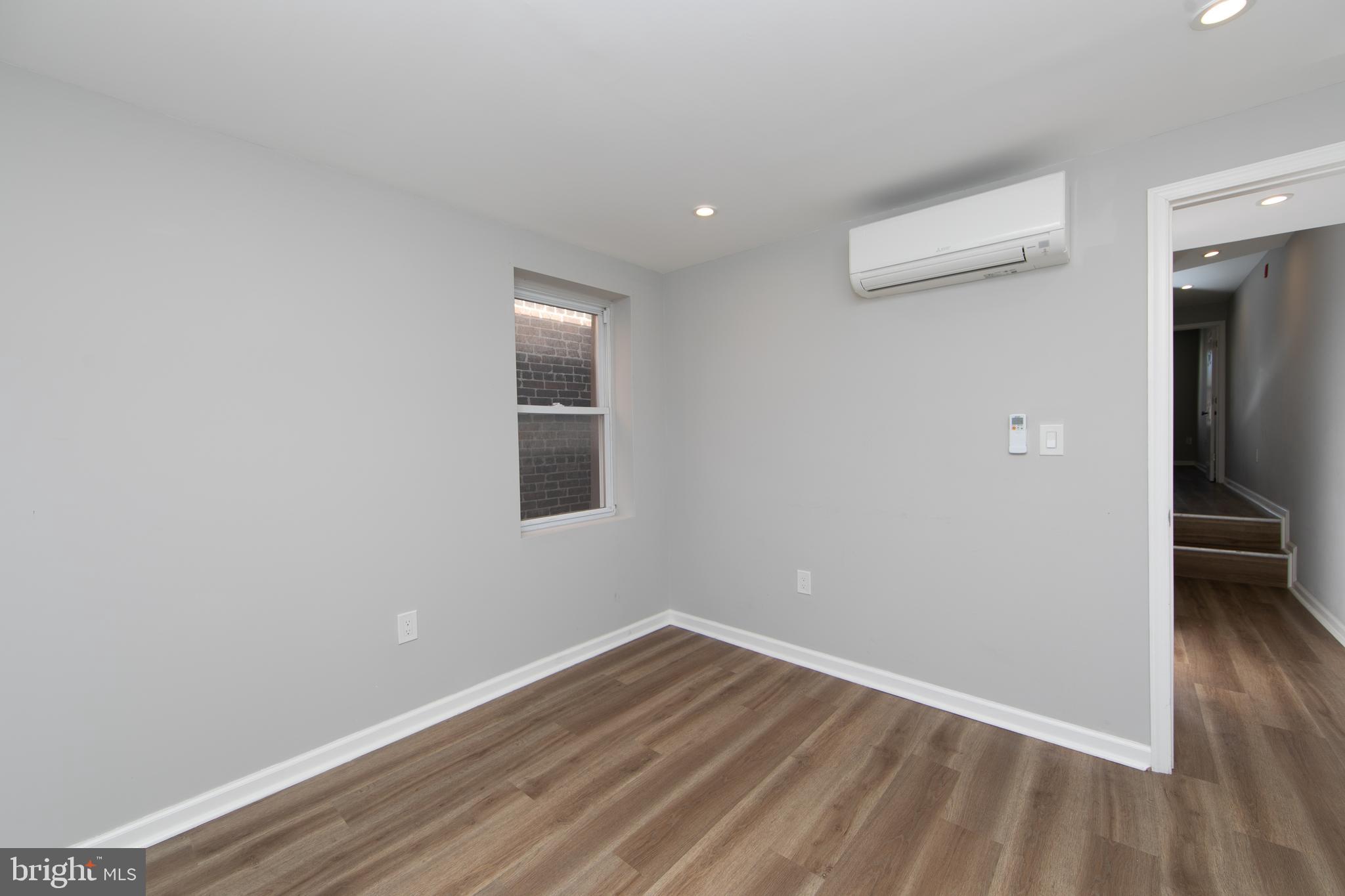 876 North 19th Street Philadelphia, PA 19130 - Photo 45 of 49 wooden floor in an empty room
