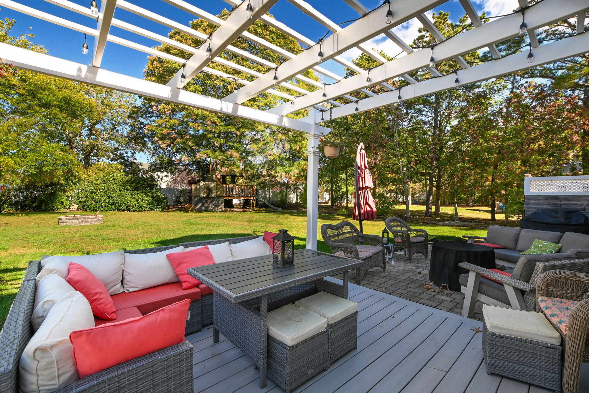a view of a chairs and table in the patio