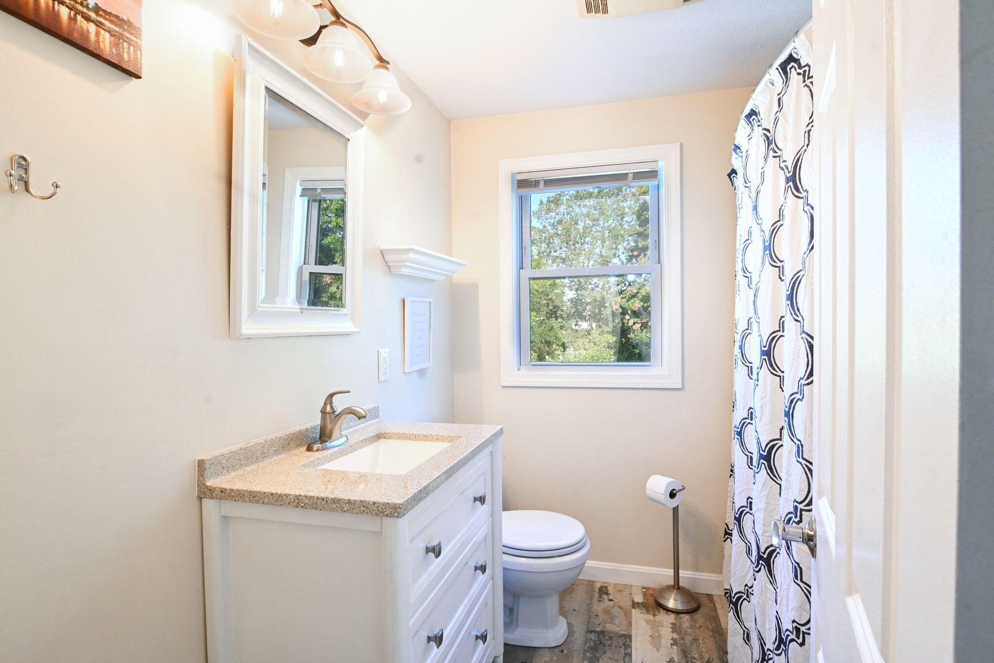 120 Snake Pond Road Forestdale, MA 02644 - Photo 15 of 32 a bathroom with a sink a toilet and a window