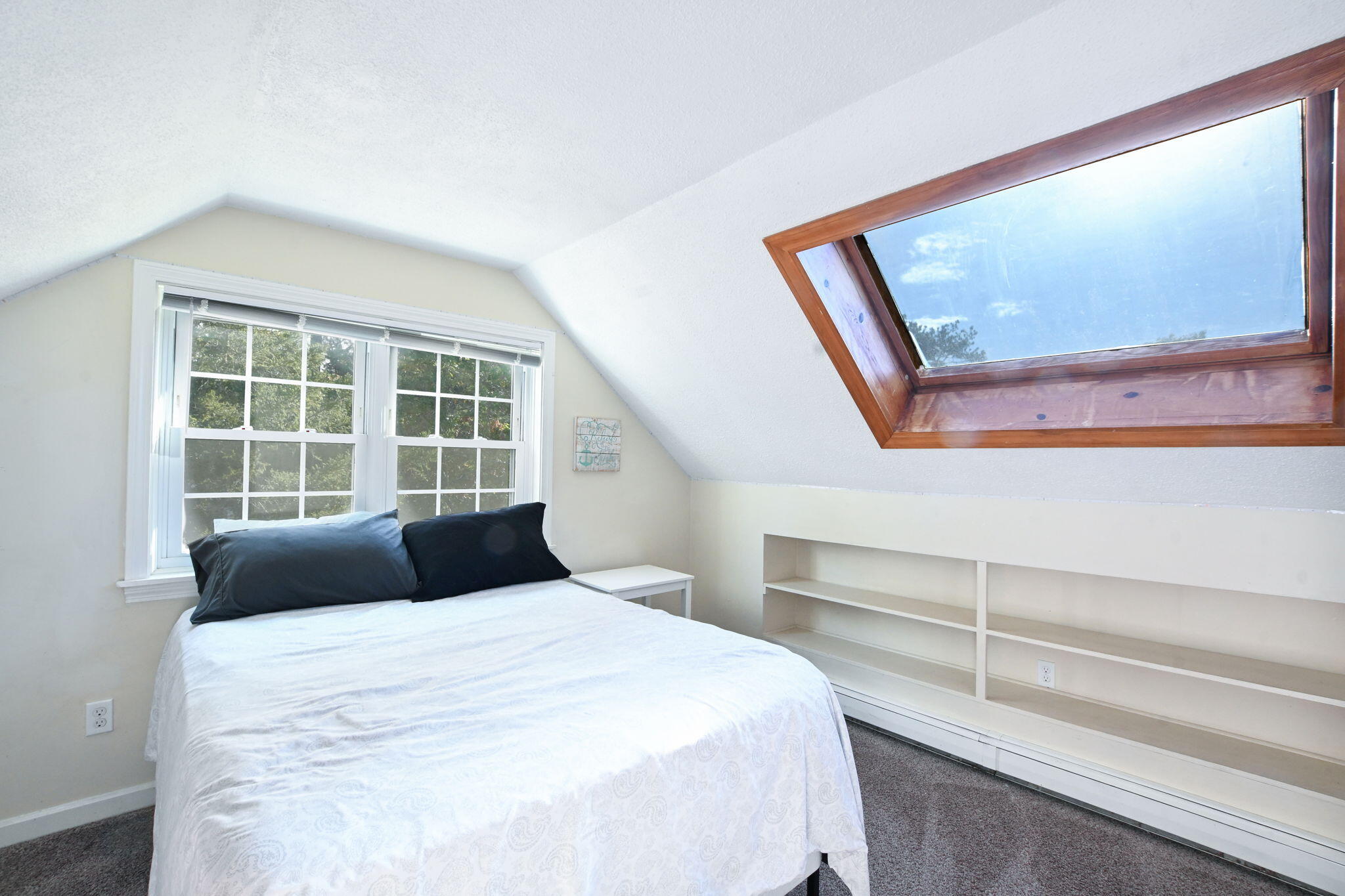 120 Snake Pond Road Forestdale, MA 02644 - Photo 17 of 32 a bedroom with a large bed and a window