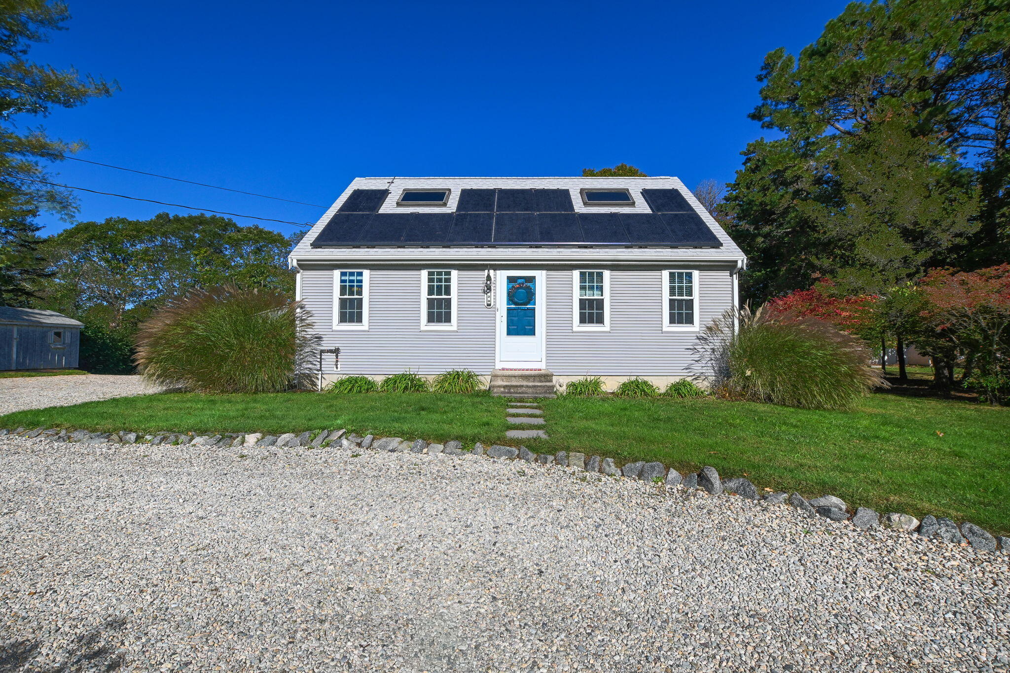 120 Snake Pond Road Forestdale, MA 02644 - Photo 18 of 32 a front view of a house with garden