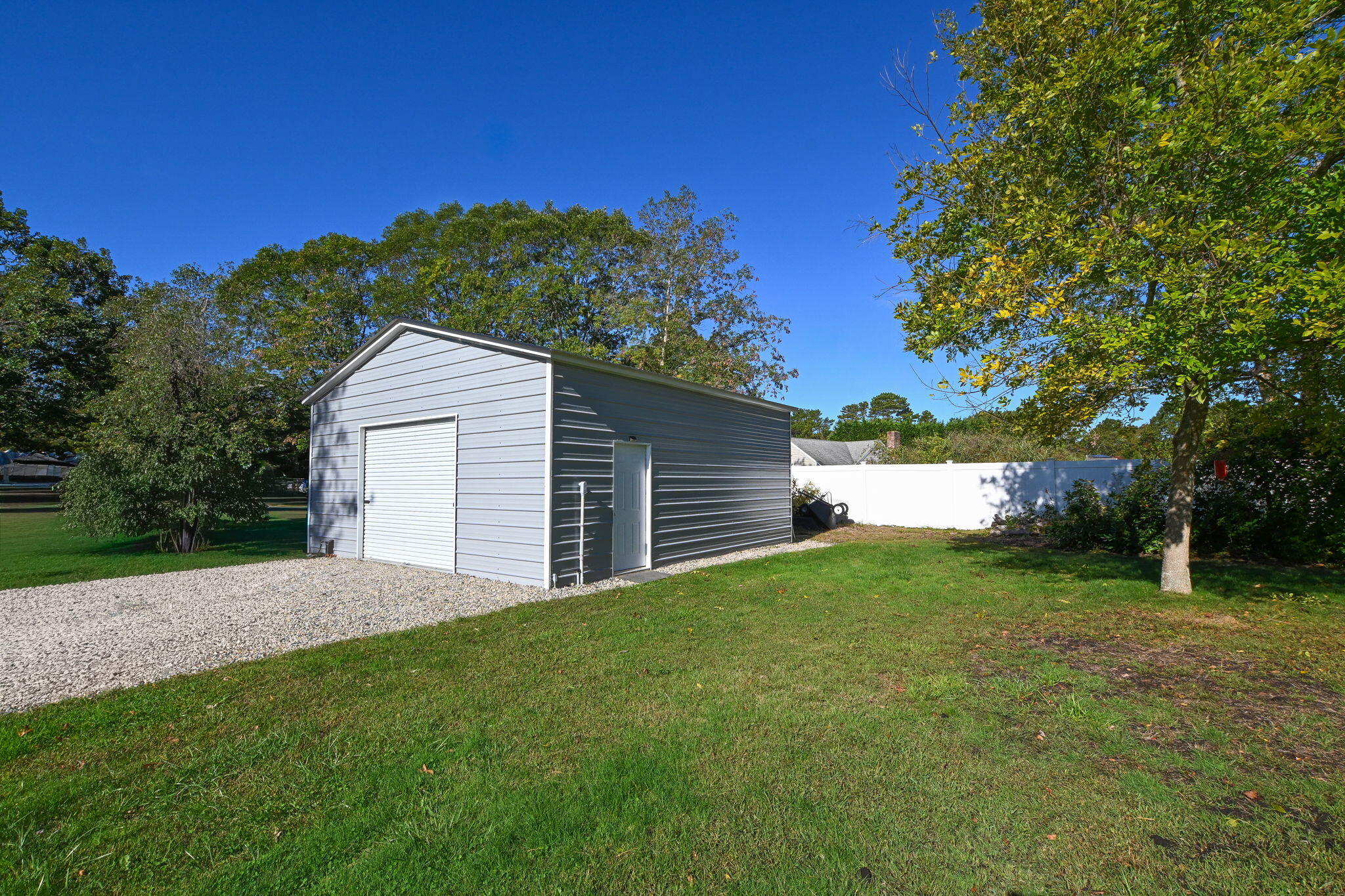 120 Snake Pond Road Forestdale, MA 02644 - Photo 24 of 32 a backyard of a house with lots of green space
