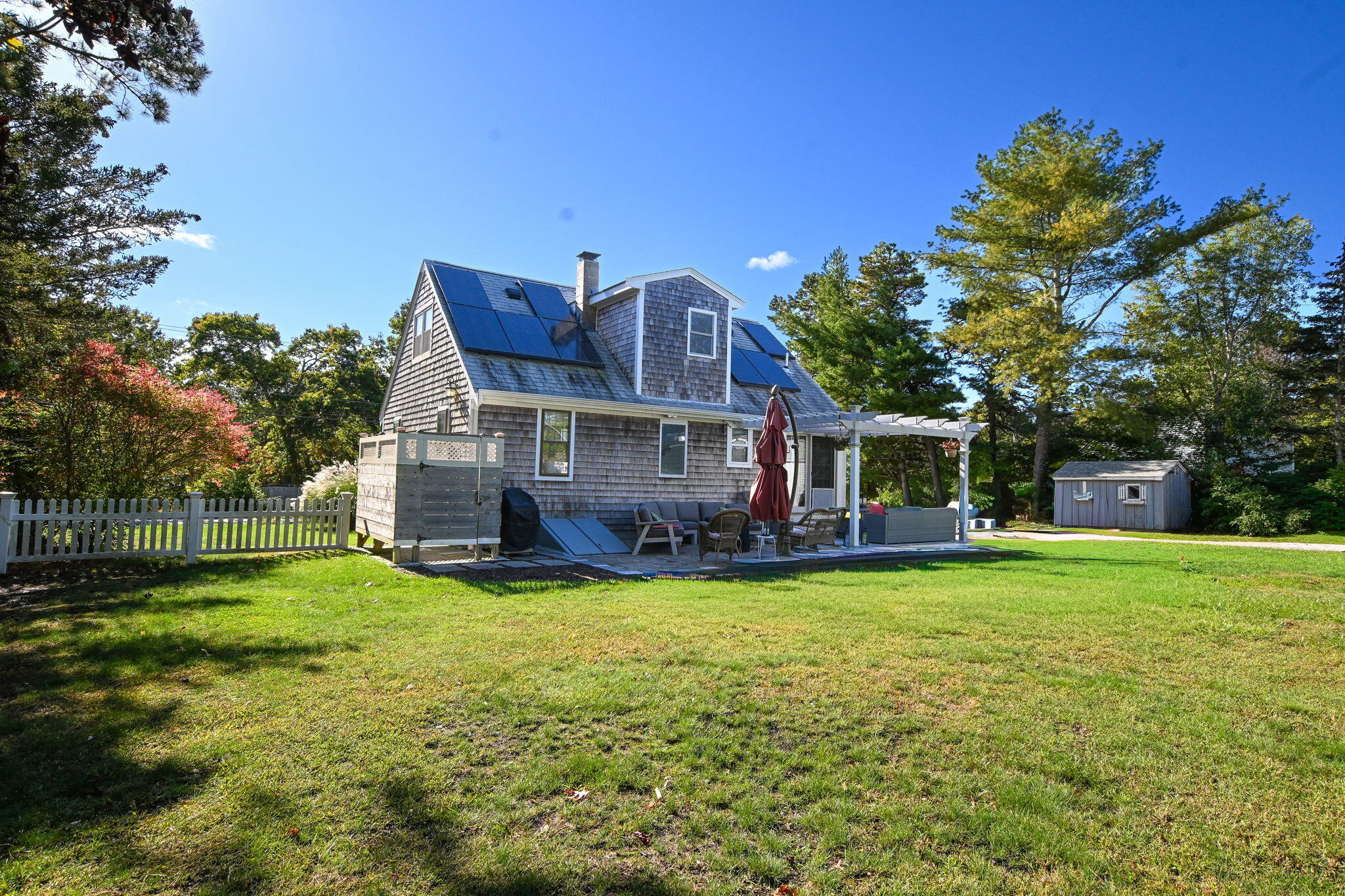 120 Snake Pond Road Forestdale, MA 02644 - Photo 26 of 32 a view of a house with a big yard plants and large trees