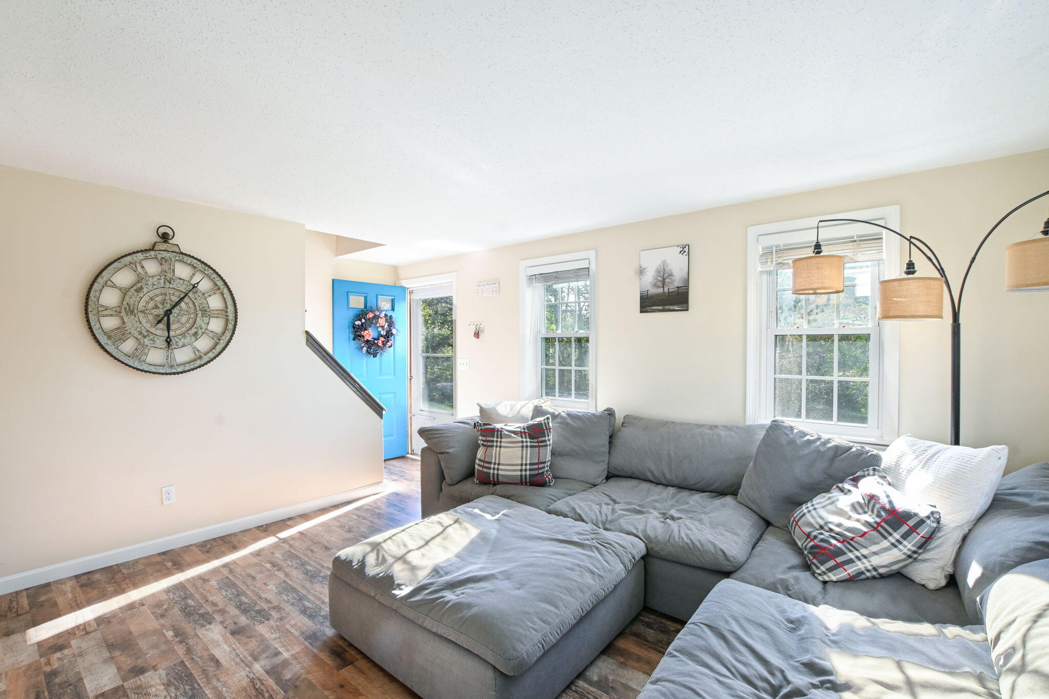 120 Snake Pond Road Forestdale, MA 02644 - Photo 5 of 32 a living room with furniture a clock and a window
