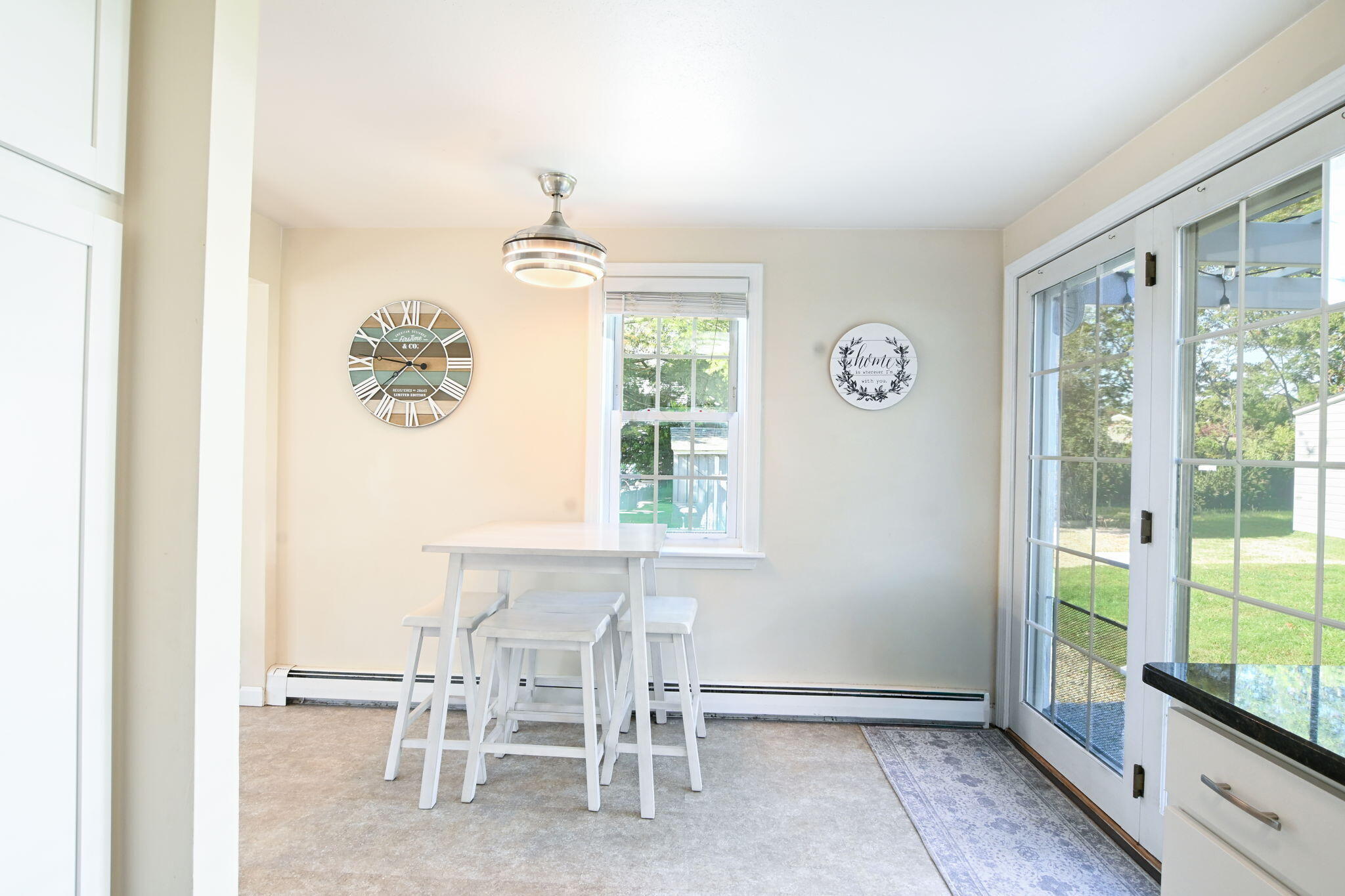 120 Snake Pond Road Forestdale, MA 02644 - Photo 8 of 32 a view of a dining room with furniture a chandelier and a window