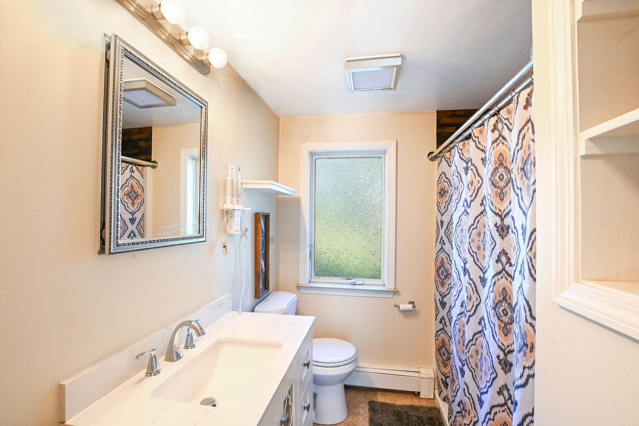 120 Snake Pond Road Forestdale, MA 02644 - Photo 10 of 32 a bathroom with a sink and mirror with toilet