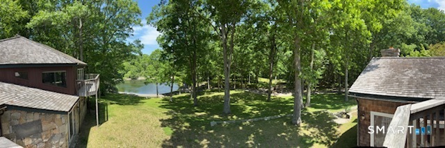 40 Looking Glass Hill Road Litchfield, CT 06750 - Photo 25 of 33 a backyard of a house with lots of green space