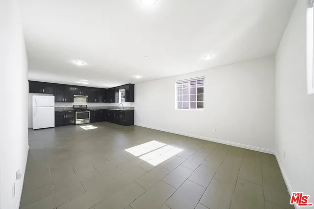 a view of kitchen and windows
