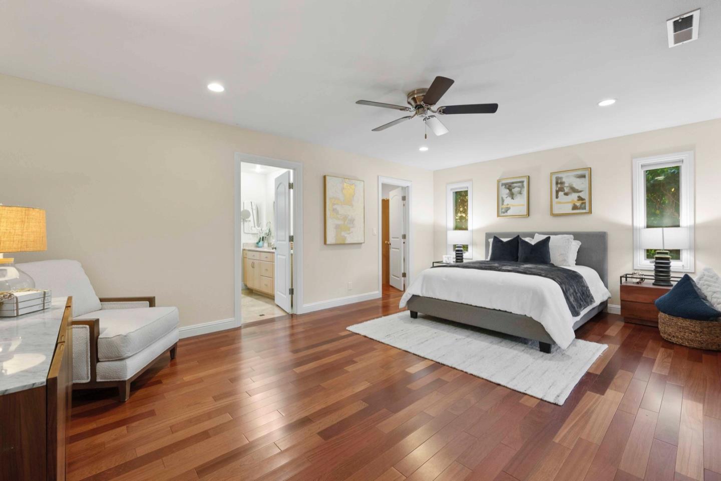 18373 Vanderbilt Drive Saratoga, CA 95070 - Photo 17 of 26 a bedroom with a bed and wooden floor
