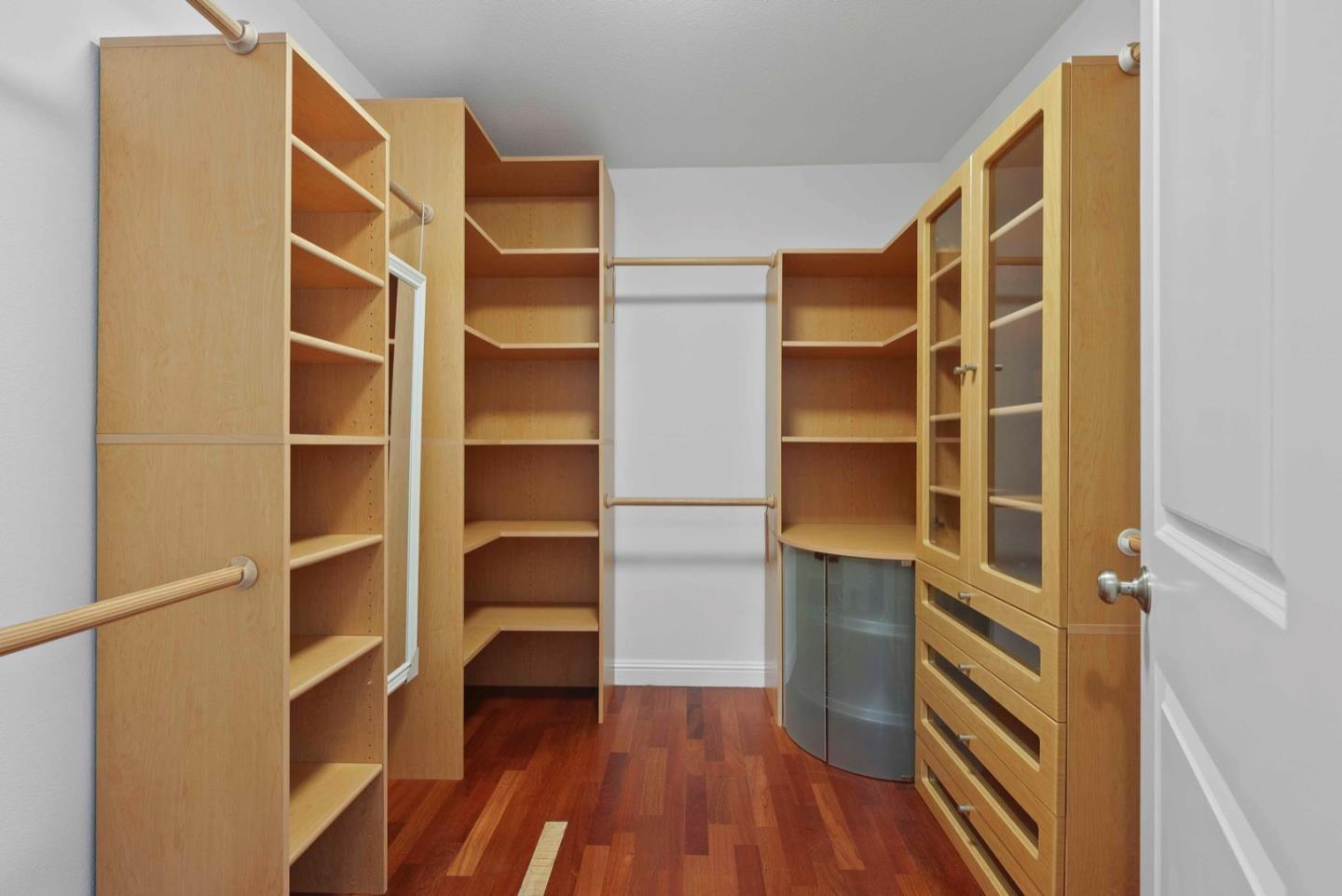 18373 Vanderbilt Drive Saratoga, CA 95070 - Photo 18 of 26 a view of walk in closet with empty racks