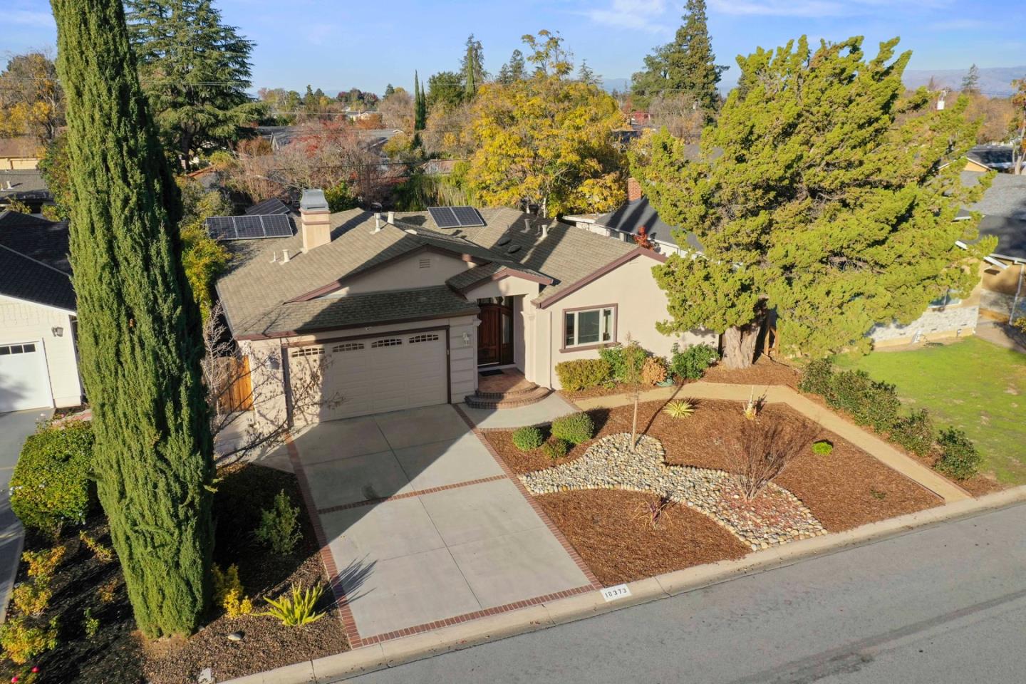 18373 Vanderbilt Drive Saratoga, CA 95070 - Photo 24 of 26 a view of a house with a tub and trees around